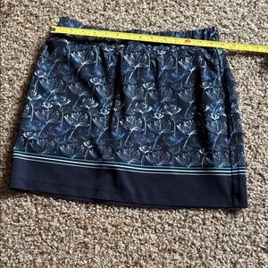 Floral Print golf skort in Black and Blue